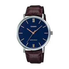 Casio watch with a blue face and brown leather strap on a white background