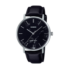 Casio watch with black leather strap and black dial on a white background