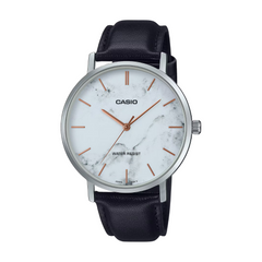 Casio watch with black leather strap and white marble-patterned dial on a white background